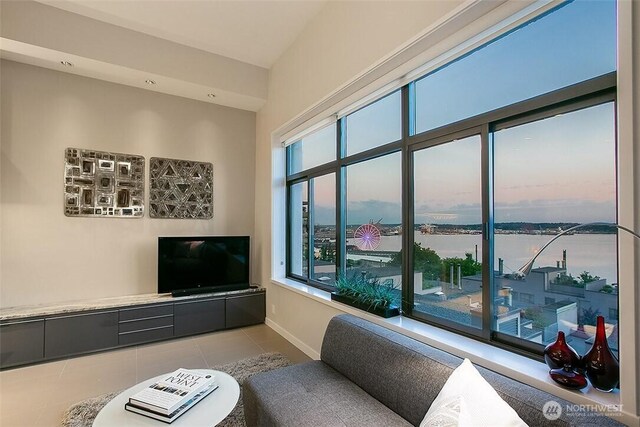 2021 1st Ave Unit G4, Seattle, WA 98121 - living area featuring tile patterned floors and baseboards