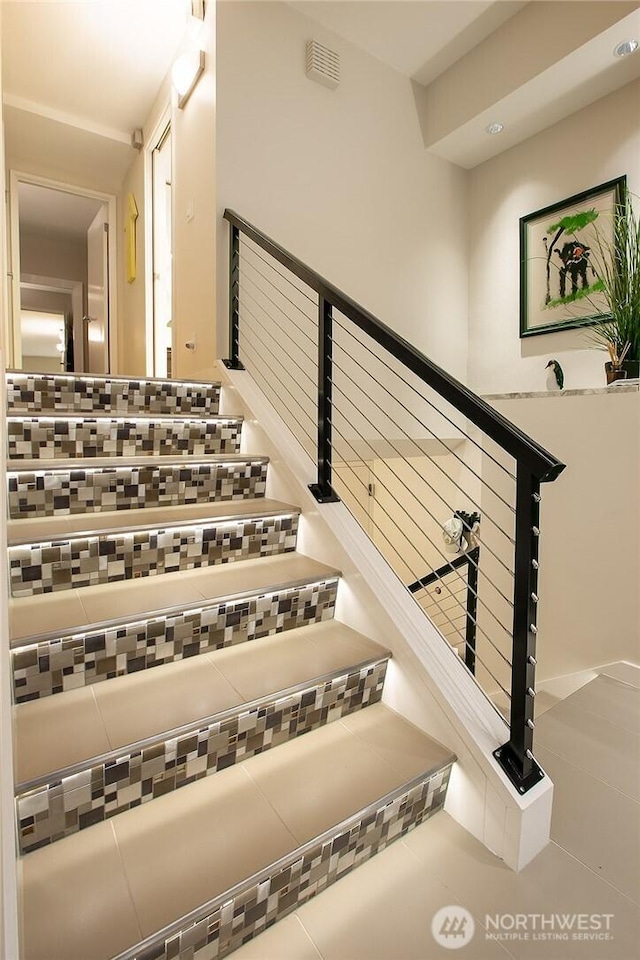2021 1st Ave Unit G4, Seattle, WA 98121 - staircase with tile patterned floors