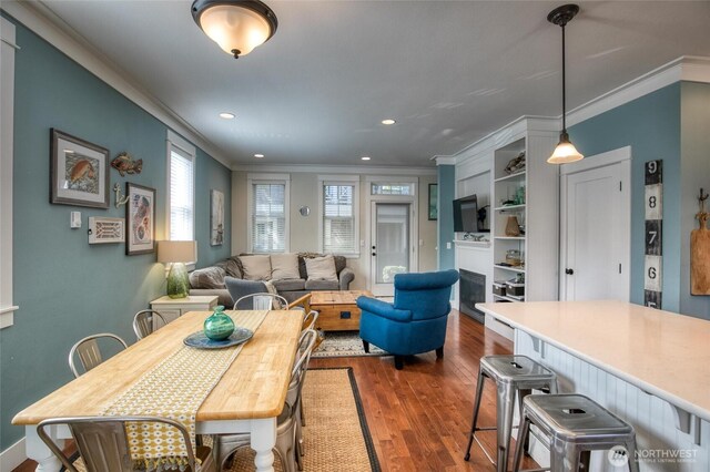 38 W Myrtle Ln, Pacific Beach, WA 98571 - dining room featuring ornamental molding, dark wood-style flooring, and recessed lighting