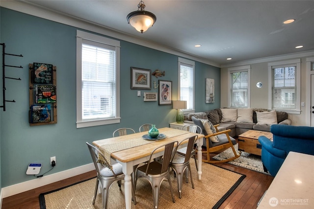 38 W Myrtle Ln, Pacific Beach, WA 98571 - dining space with crown molding, dark wood-style flooring, healthy amount of natural light, baseboards, and recessed lighting
