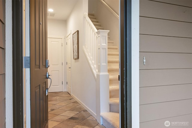 35314 SE Sequoia Pl Unit B, Snoqualmie, WA 98065 - hallway with stairs, baseboards, and light tile patterned floors