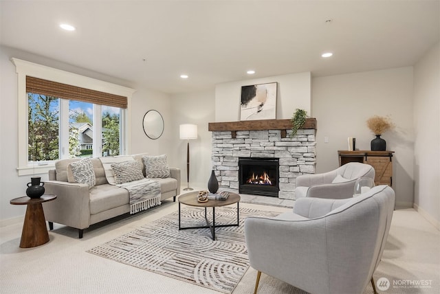 35314 SE Sequoia Pl Unit B, Snoqualmie, WA 98065 - living area featuring light carpet, a stone fireplace, recessed lighting, and baseboards