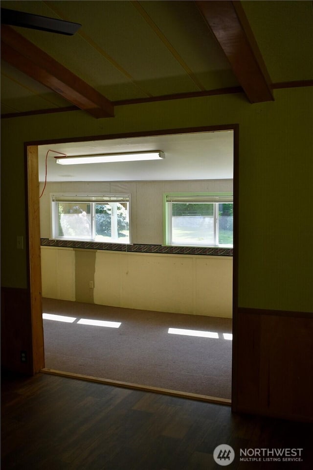 847 Cannon Rd, Packwood, WA 98361 - empty room featuring beamed ceiling, wood finished floors, and plenty of natural light
