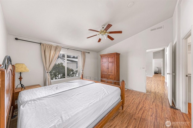 6350 Portal Way Unit 75, Ferndale, WA 98248 - bedroom featuring lofted ceiling, light wood-type flooring, and a ceiling fan