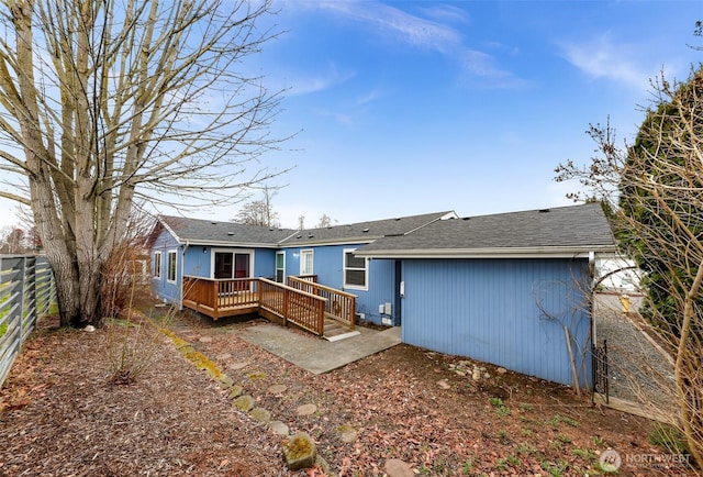 6350 Portal Way Unit 75, Ferndale, WA 98248 - back of house featuring a deck and a shingled roof