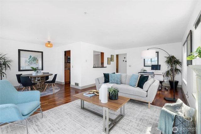 1711 E Olive Way Unit 519, Seattle, WA 98102 - living area with wood finished floors and baseboards