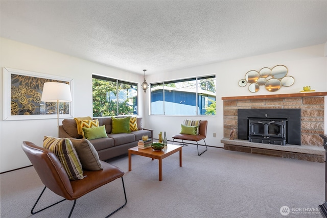 5228 56th Ave S, Seattle, WA 98118 - carpeted living area with a textured ceiling and a fireplace with raised hearth