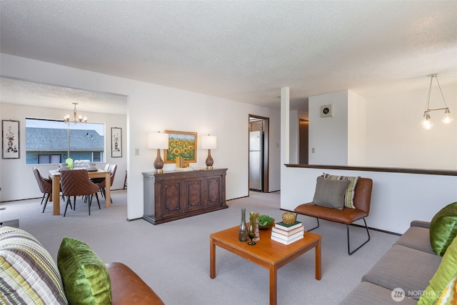5228 56th Ave S, Seattle, WA 98118 - living room with a chandelier, a textured ceiling, and carpet floors