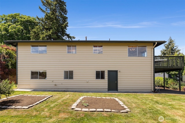 5228 56th Ave S, Seattle, WA 98118 - back of house featuring a lawn and a deck