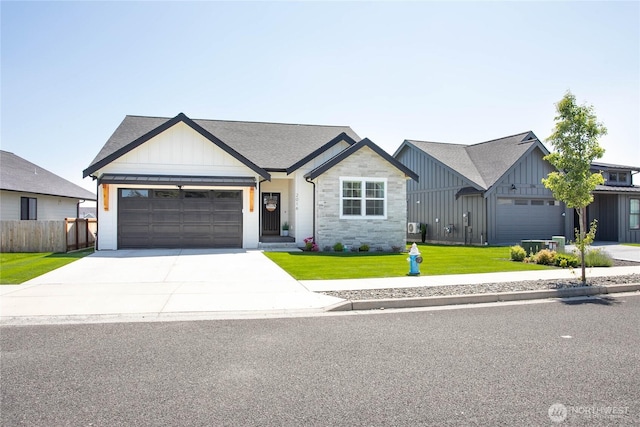 2016 Steelhead Way, Lynden, WA 98264 - modern farmhouse style home featuring board and batten siding, driveway, and an attached garage