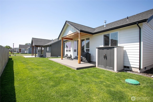 2016 Steelhead Way, Lynden, WA 98264 - rear view of property with a patio area, a shingled roof, and board and batten siding