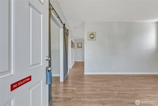 28140 239th Ave SE, Maple Valley, WA 98038 - entryway with a barn door and light wood-type flooring