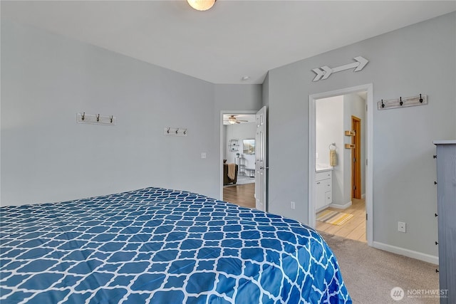 28140 239th Ave SE, Maple Valley, WA 98038 - carpeted bedroom featuring baseboards and ensuite bath