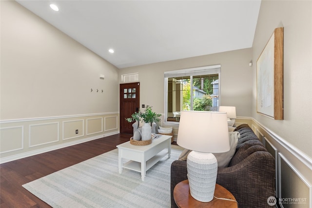 111 170th St SE, Bothell, WA 98012 - living room featuring wood finished floors, vaulted ceiling, wainscoting, a decorative wall, and recessed lighting