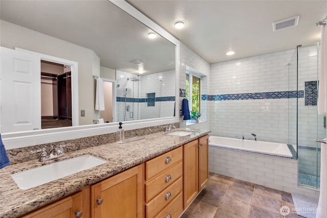 111 170th St SE, Bothell, WA 98012 - full bathroom featuring a shower stall, double vanity, and tiled bath