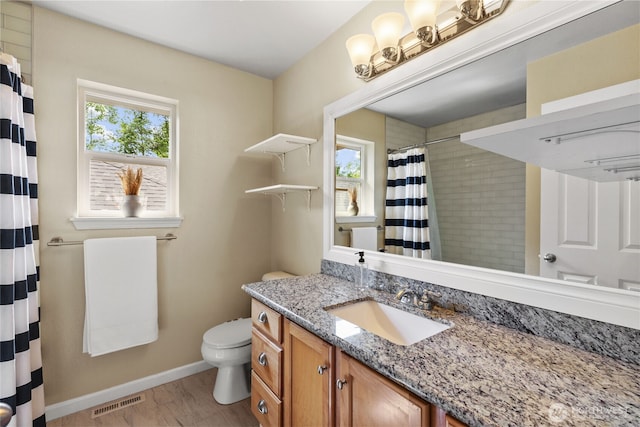 111 170th St SE, Bothell, WA 98012 - bathroom featuring vanity, wood finished floors, and curtained shower