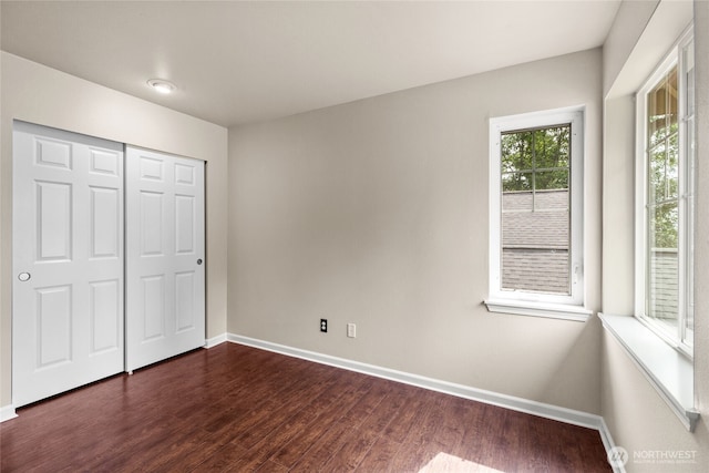 111 170th St SE, Bothell, WA 98012 - unfurnished bedroom featuring dark wood-style floors and a closet