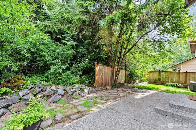 111 170th St SE, Bothell, WA 98012 - fenced backyard featuring a patio area
