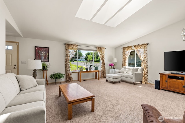 401 Huntting Rd, Silver Creek, WA 98585 - living room featuring a skylight, lofted ceiling, and light carpet