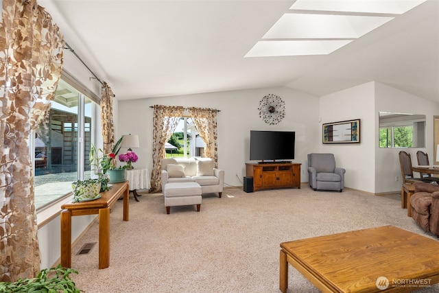 401 Huntting Rd, Silver Creek, WA 98585 - living room with a skylight, light colored carpet, healthy amount of natural light, and vaulted ceiling