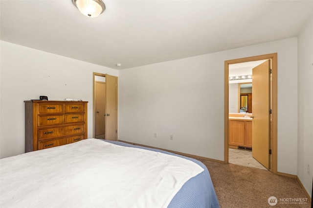 401 Huntting Rd, Silver Creek, WA 98585 - bedroom with light carpet, ensuite bathroom, and baseboards