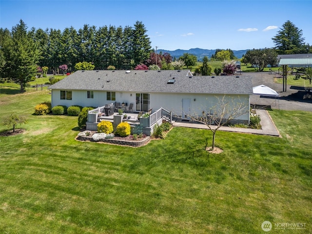 401 Huntting Rd, Silver Creek, WA 98585 - back of house featuring a lawn, a deck with mountain view, and outdoor lounge area