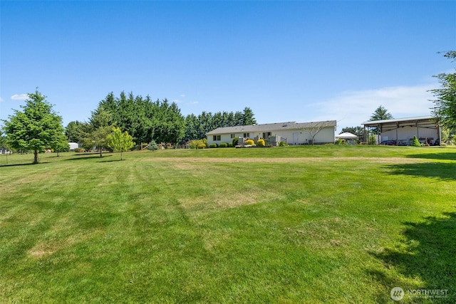 401 Huntting Rd, Silver Creek, WA 98585 - view of grassy yard with a detached carport