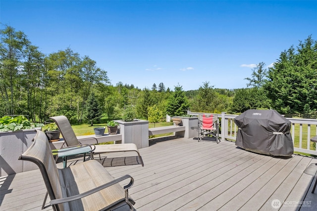 401 Huntting Rd, Silver Creek, WA 98585 - deck with grilling area and a view of trees