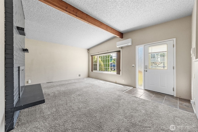11401 69th Pl S, Seattle, WA 98178 - unfurnished living room featuring a wall mounted AC, a textured ceiling, carpet floors, a brick fireplace, and tile patterned flooring