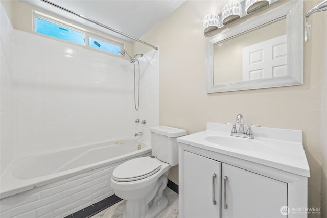 11401 69th Pl S, Seattle, WA 98178 - bathroom featuring marble look tile flooring, shower / tub combination, toilet, and vanity