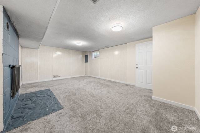 11401 69th Pl S, Seattle, WA 98178 - basement featuring carpet flooring, a textured ceiling, and baseboards