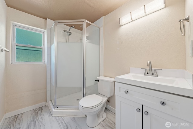 11401 69th Pl S, Seattle, WA 98178 - bathroom with toilet, a shower stall, vanity, and marble finish floors