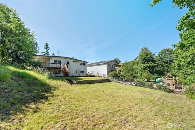 11401 69th Pl S, Seattle, WA 98178 - view of yard with stairway, a deck, and a playground