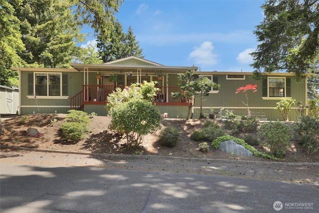23708 Locust Way Unit 8B, Bothell, WA 98021 - manufactured / mobile home featuring covered porch