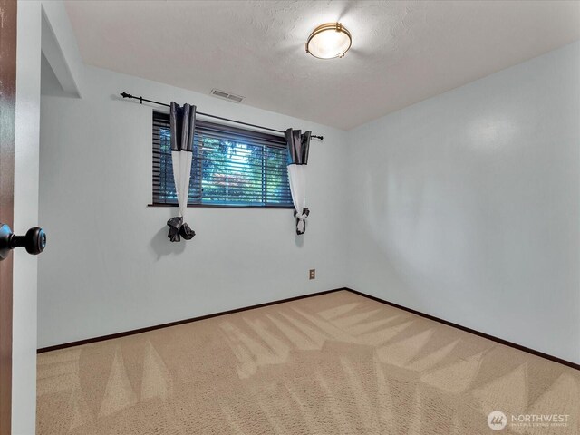 713 220th St SW, Bothell, WA 98021 - unfurnished room with baseboards and carpet flooring
