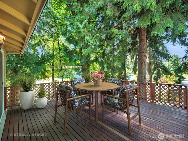 713 220th St SW, Bothell, WA 98021 - wooden deck featuring outdoor dining space