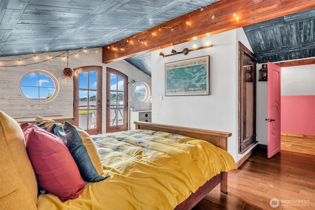 1811 Bay St, Port Orchard, WA 98366 - bedroom with french doors, wood finished floors, access to outside, beam ceiling, and baseboards