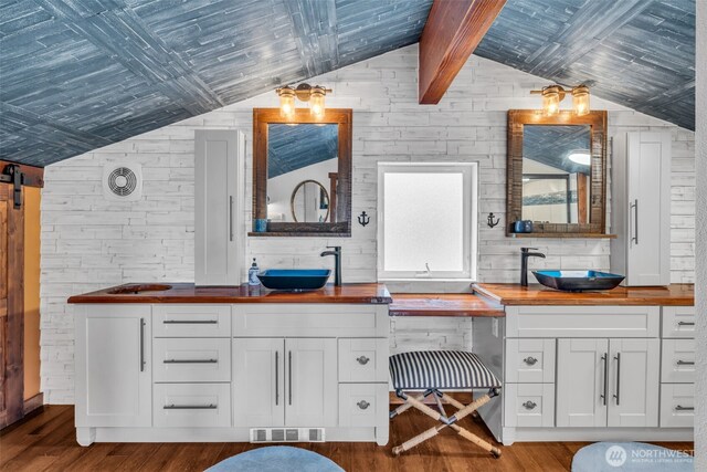 1811 Bay St, Port Orchard, WA 98366 - full bathroom featuring wood finished floors, double vanity, and wooden walls