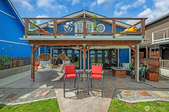 1811 Bay St, Port Orchard, WA 98366 - view of patio / terrace with an outdoor fire pit and a balcony