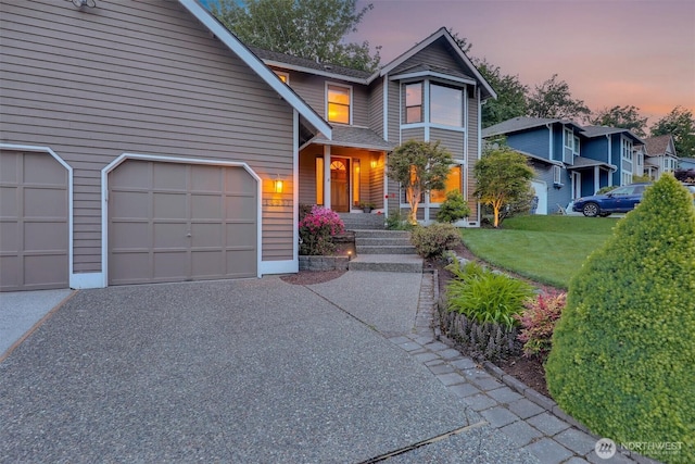 14937 104th Ave NE, Bothell, WA 98011 - view of front of home with driveway, an attached garage, and a yard