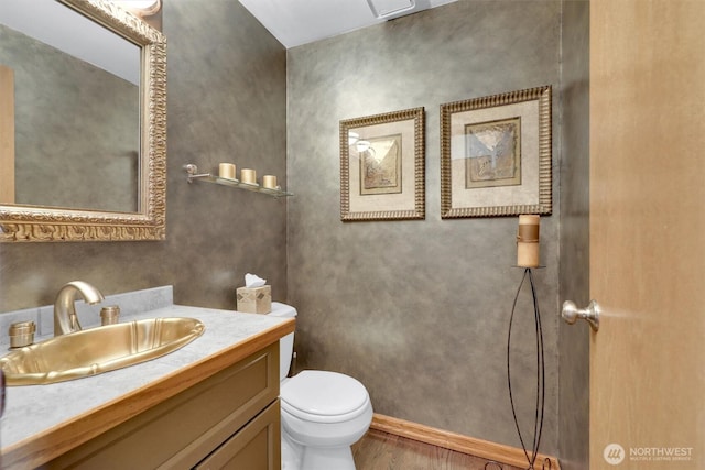 14937 104th Ave NE, Bothell, WA 98011 - bathroom with vanity, toilet, wood finished floors, and baseboards