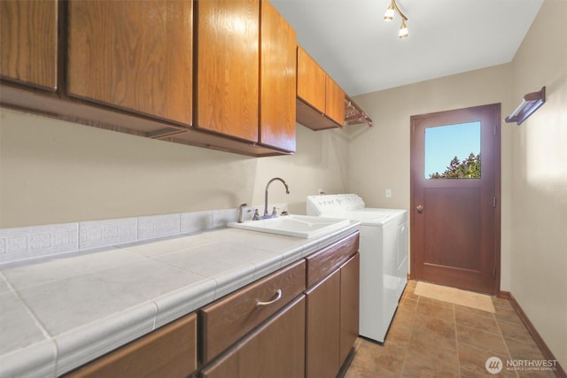 14937 104th Ave NE, Bothell, WA 98011 - washroom with cabinet space, separate washer and dryer, and baseboards