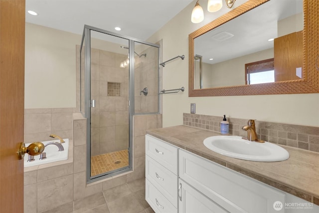 14937 104th Ave NE, Bothell, WA 98011 - bathroom featuring vanity, a shower stall, a garden tub, tile patterned floors, and recessed lighting