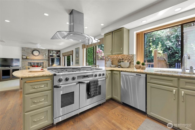 14937 104th Ave NE, Bothell, WA 98011 - kitchen with stainless steel appliances, a peninsula, green cabinetry, open floor plan, and a sink