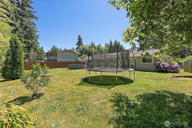 21301 118th Street Ct E, Bonney Lake, WA 98391 - view of yard featuring a trampoline