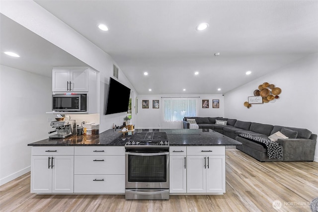 23059 Ida Ln, Sedro Woolley, WA 98284 - kitchen featuring stainless steel appliances, open floor plan, white cabinetry, light wood-type flooring, and recessed lighting