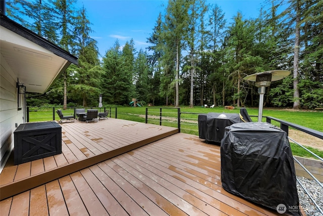23059 Ida Ln, Sedro Woolley, WA 98284 - deck with outdoor dining space, a yard, and grilling area