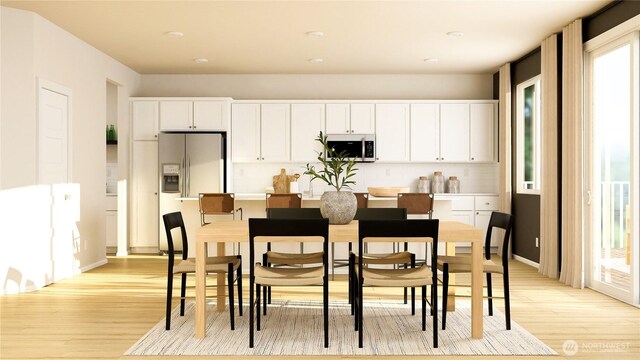 13485 200th Ave SE, Monroe, WA 98272 - dining area featuring light wood-style flooring, recessed lighting, and baseboards