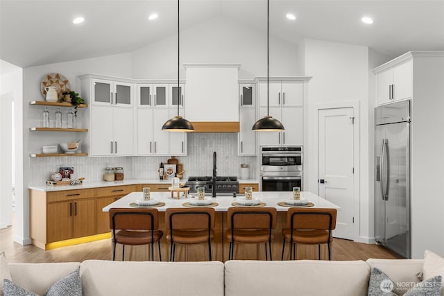 1516 131st Ave NE, Lake Stevens, WA 98258 - kitchen featuring appliances with stainless steel finishes, light countertops, open shelves, tasteful backsplash, and recessed lighting