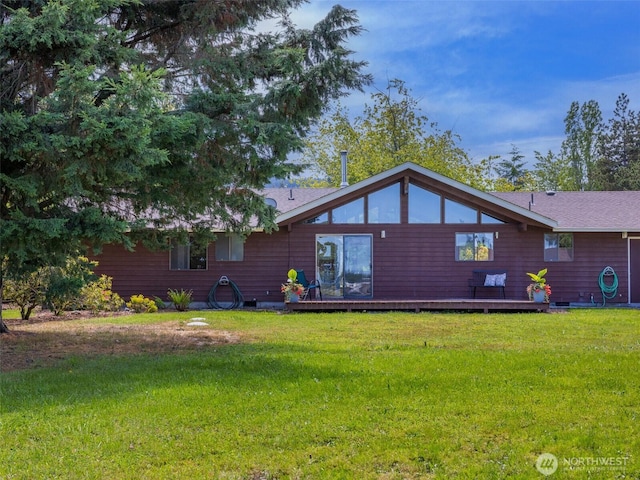 52 W Pheasant Ln, Sequim, WA 98382 - back of property with a yard and a wooden deck